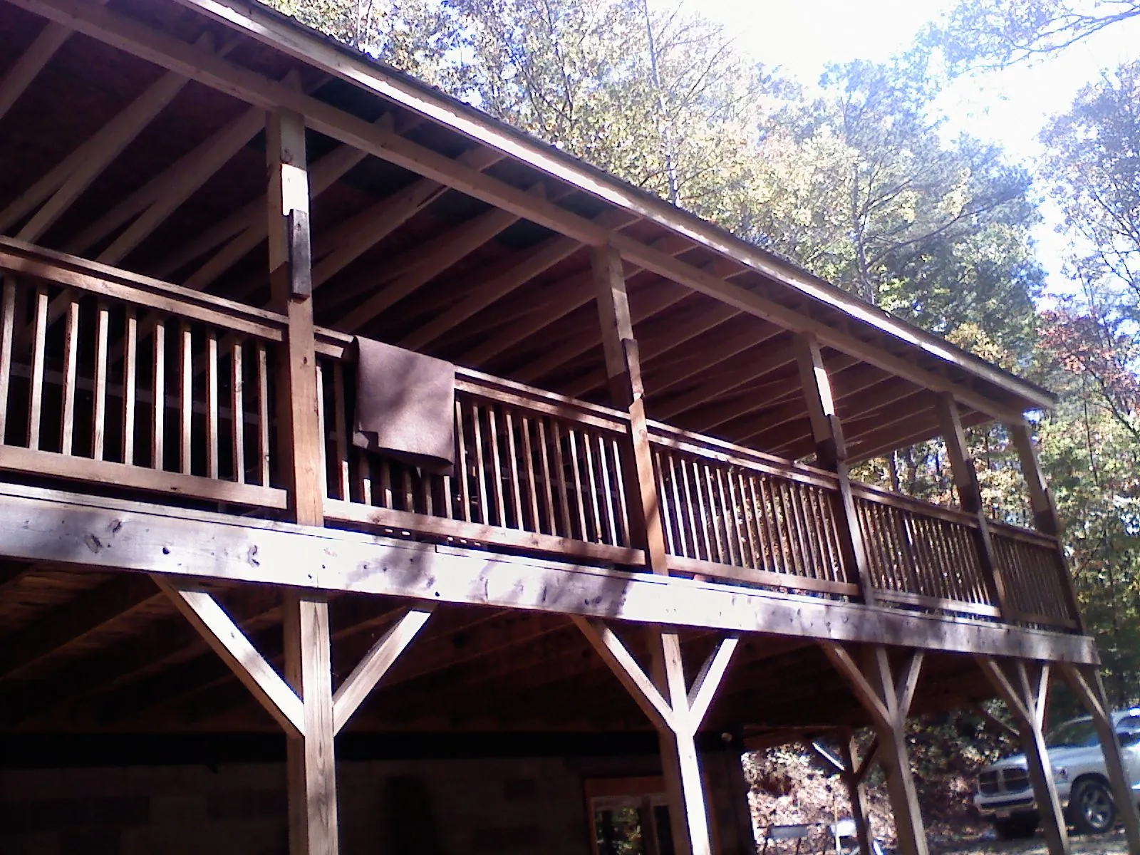 Timber framing under a new elevated porch and deck — Roof Leak Repair in Leslie by Roofing Brothers